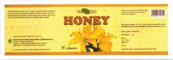 Honey With Word Dhanvantari Device mark 2261502 Trademark