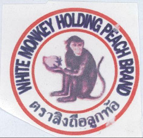 White Monkey Holding Peach Brand Device mark 2094516 Trademark