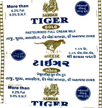 Word Tiger (in Gujarati Also) And Device Of A Tiger Device mark 1173547 Trademark